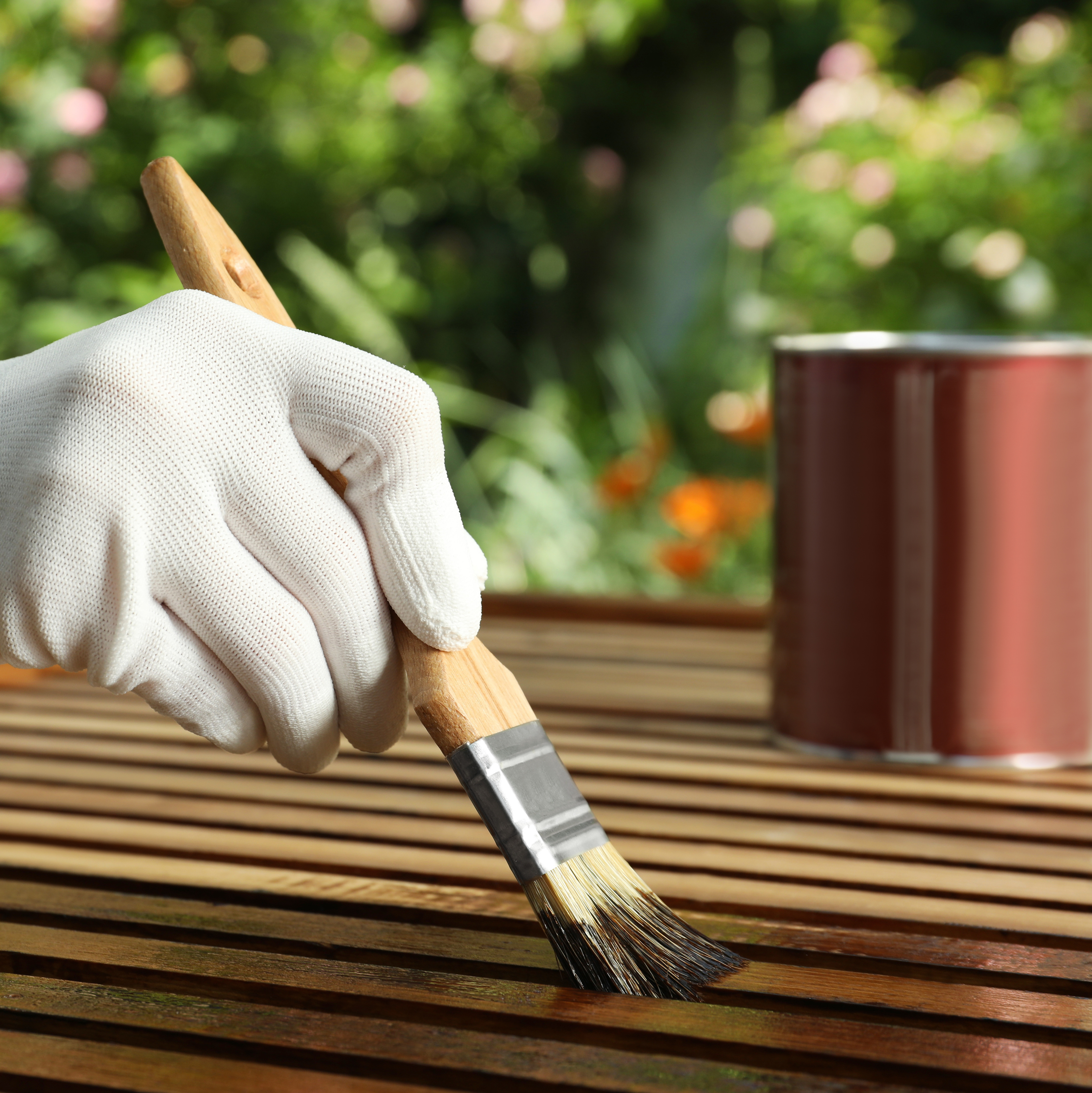 Treating wooden garden furniture in preparation for summer